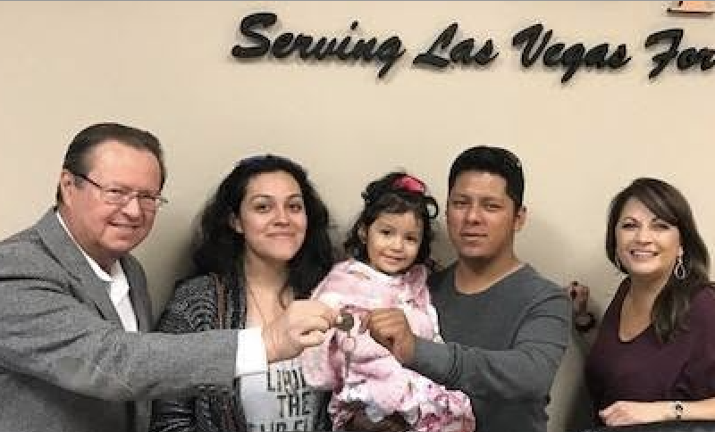 Don Salazar poses with a family